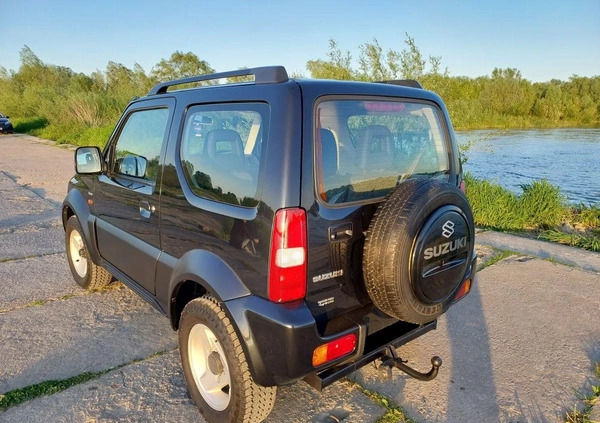 Suzuki Jimny cena 26500 przebieg: 242700, rok produkcji 2003 z Puławy małe 277